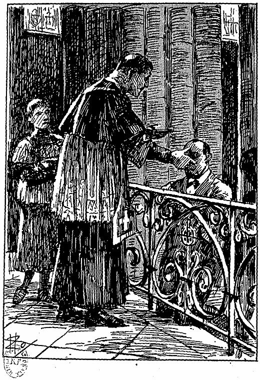 Un prêtre donnant les cendres à un fidèle.